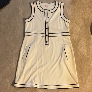 Chic Cream Sleeveless Dress with Black Trim